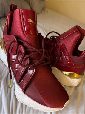 Puma Women's Metallic Wine Red Sneakers with Gold Accent
